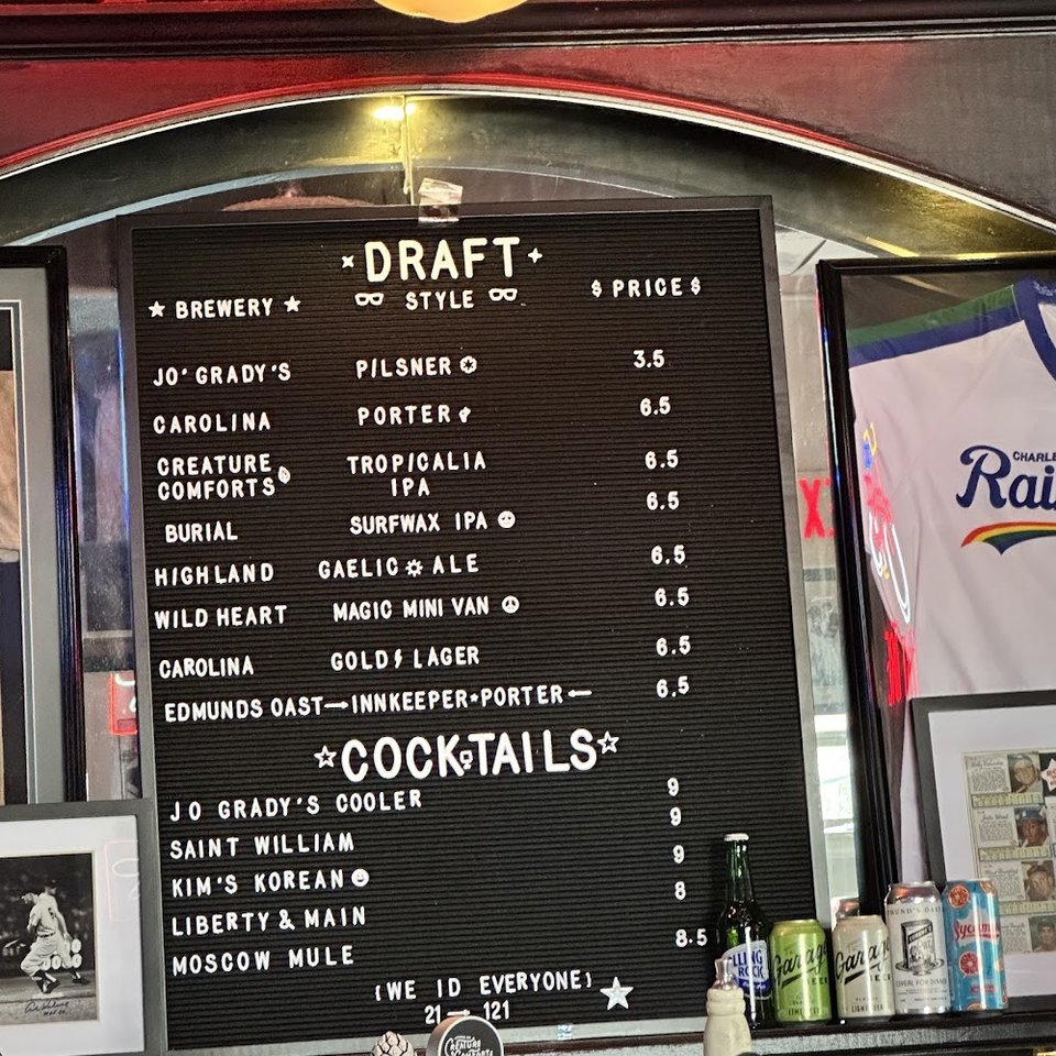 Printed menu for burgers, sandwiches, and bar favorites.